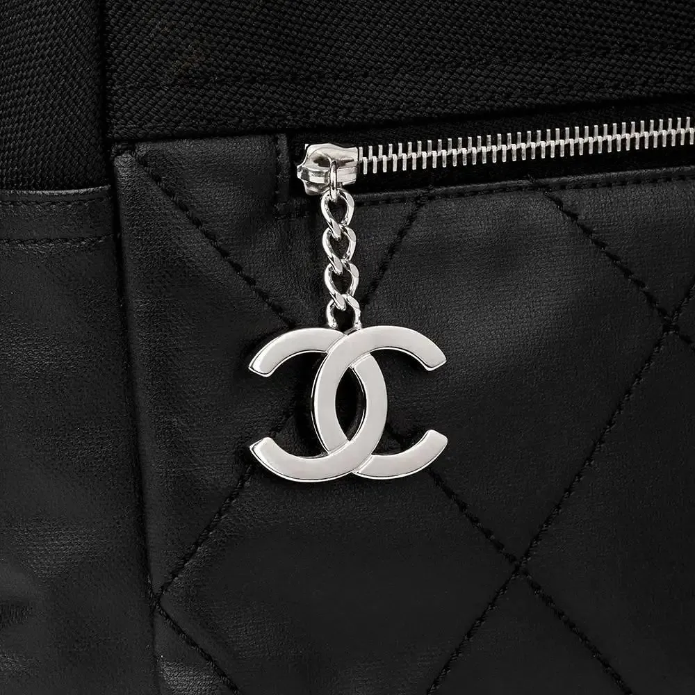 CHANEL PARIS BIARRITZ CC QUILTED COATED CANVAS BACKPACK