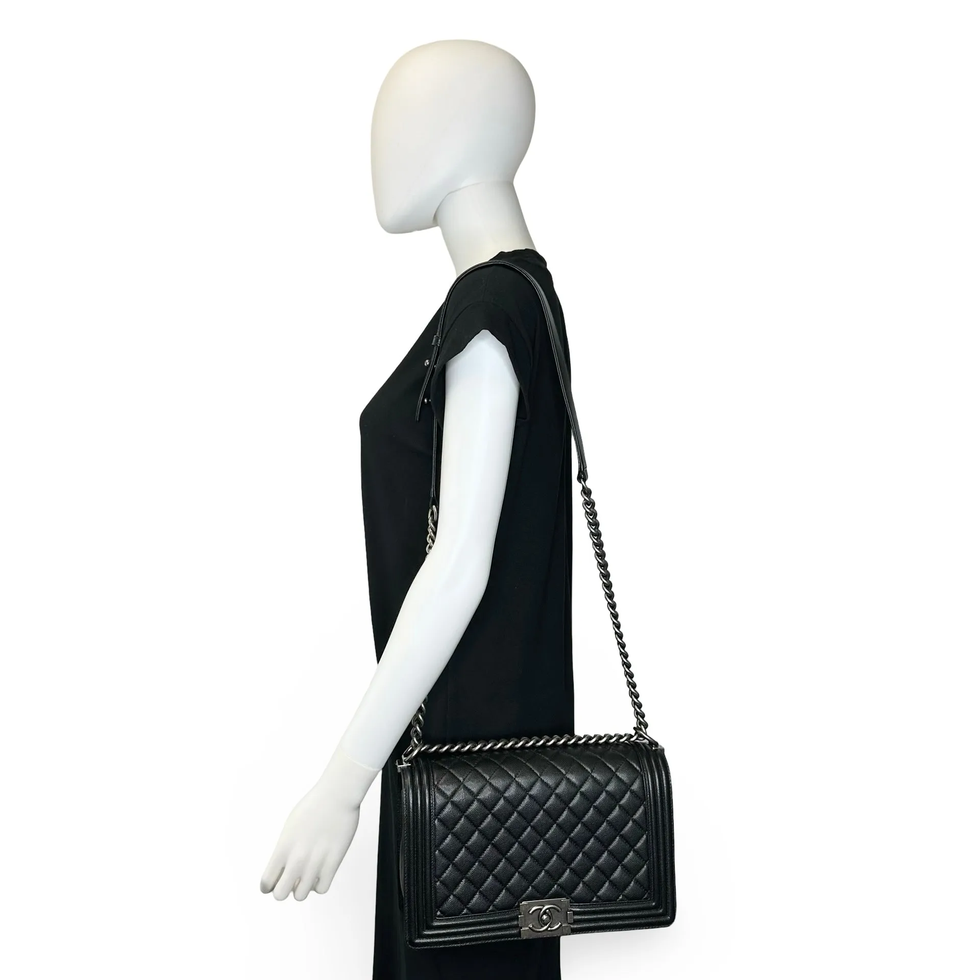 CHANEL: Quilted Caviar New Medium Boy Bag