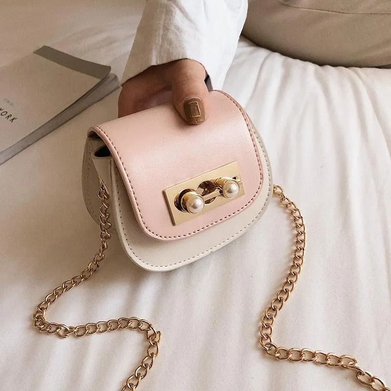 Contrasting mini saddle bag