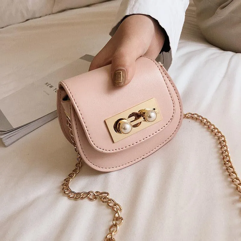 Contrasting mini saddle bag