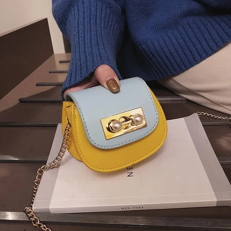 Contrasting mini saddle bag