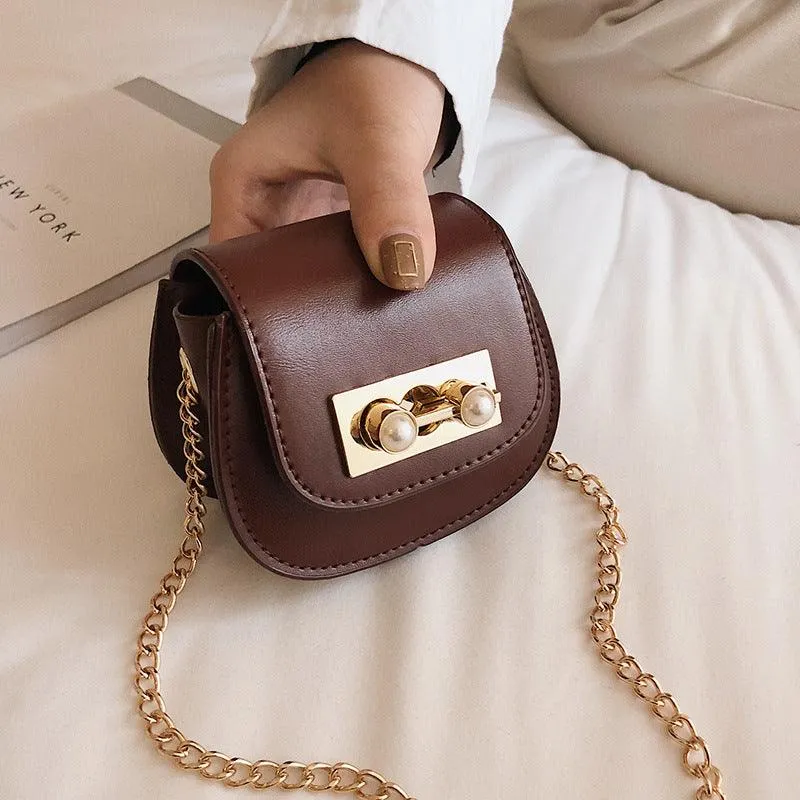 Contrasting mini saddle bag