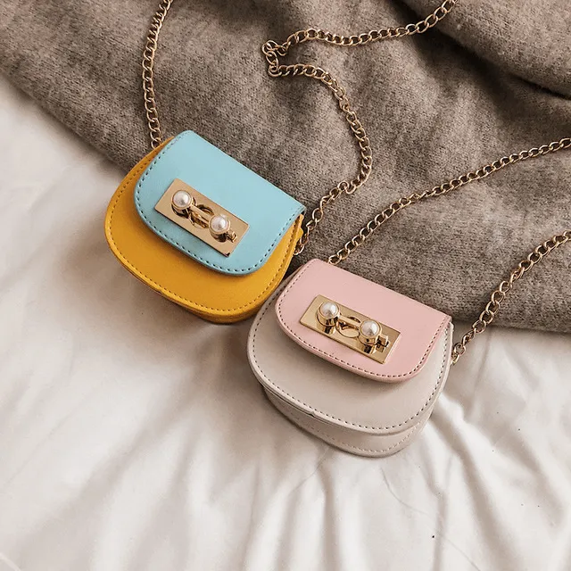 Contrasting mini saddle bag
