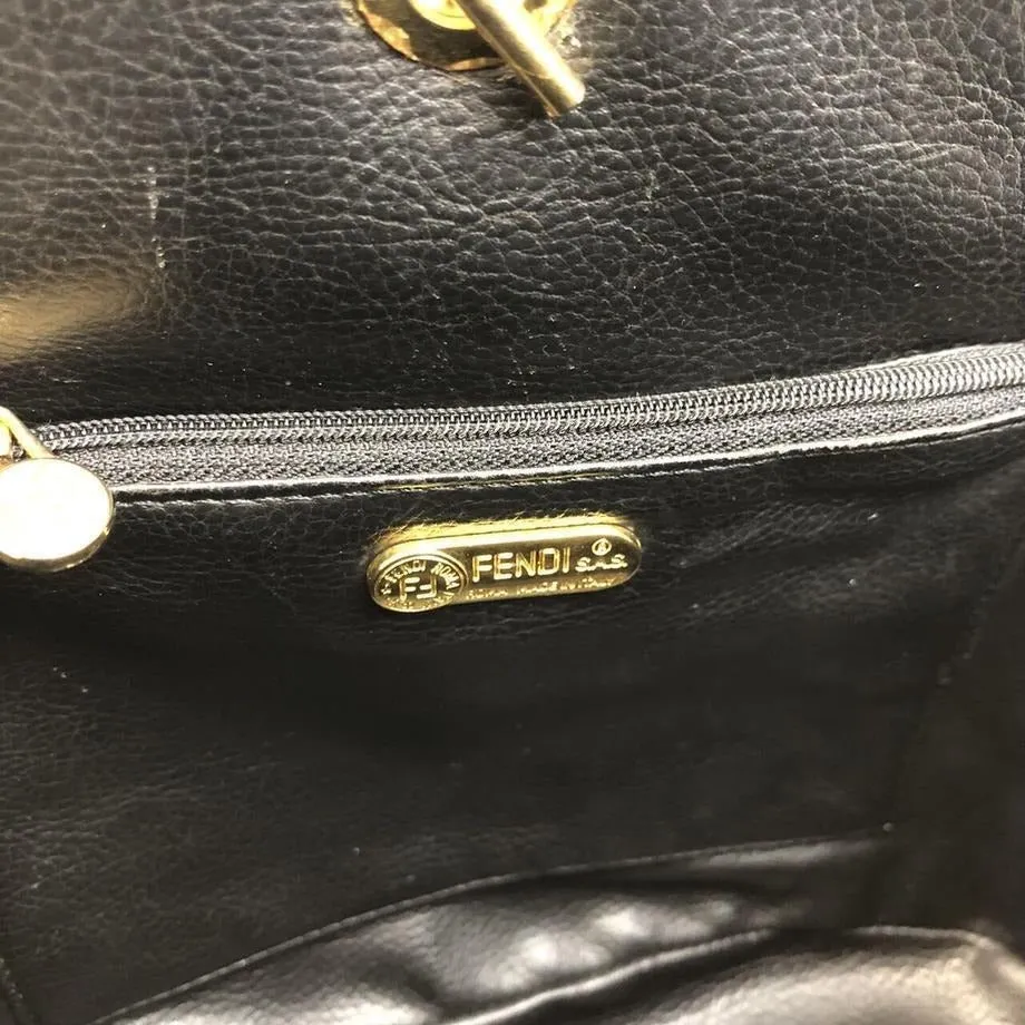 Fendi, black quilted suede with a 'pasta' or 'noodle' design, two way, sling style- clutch or cross body bag with gold 'pasta' accent beads